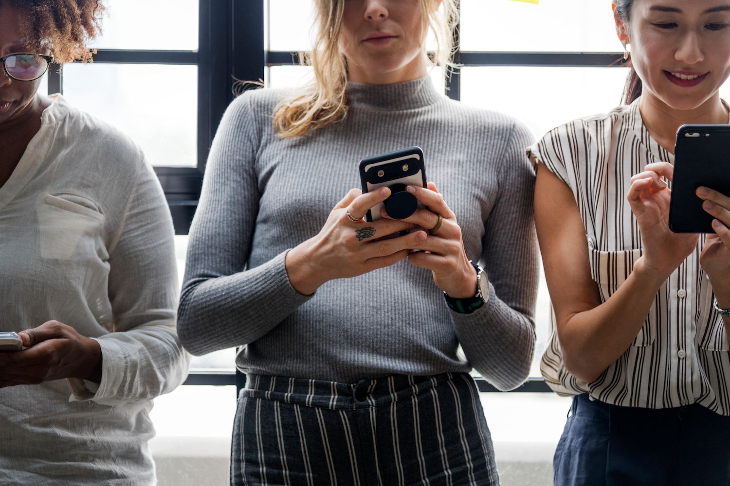 People sending and receiving emails on different devices